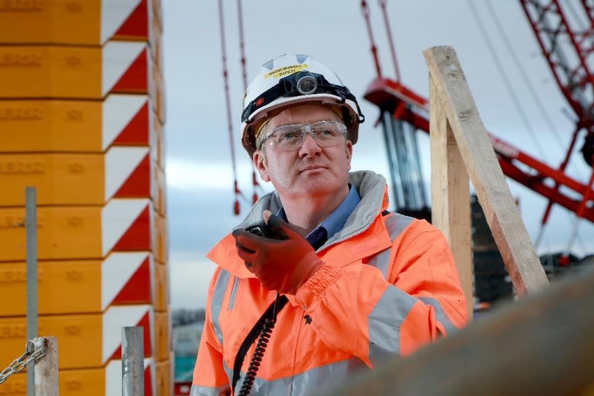 David Murray wearing safety equipment at a construction site
