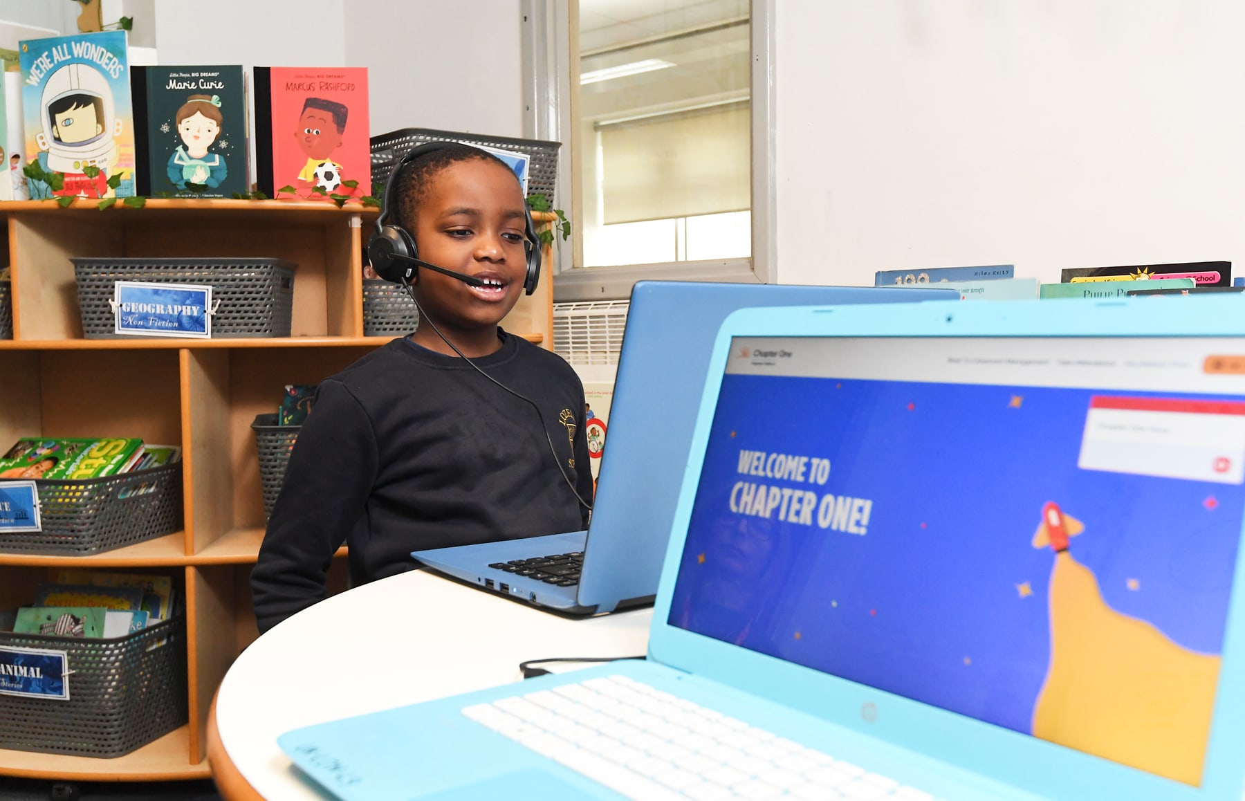 A pupil using the Chapter One online reading programme in a classroom